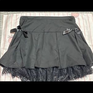 Black skirt with ribbon and lace under skirt